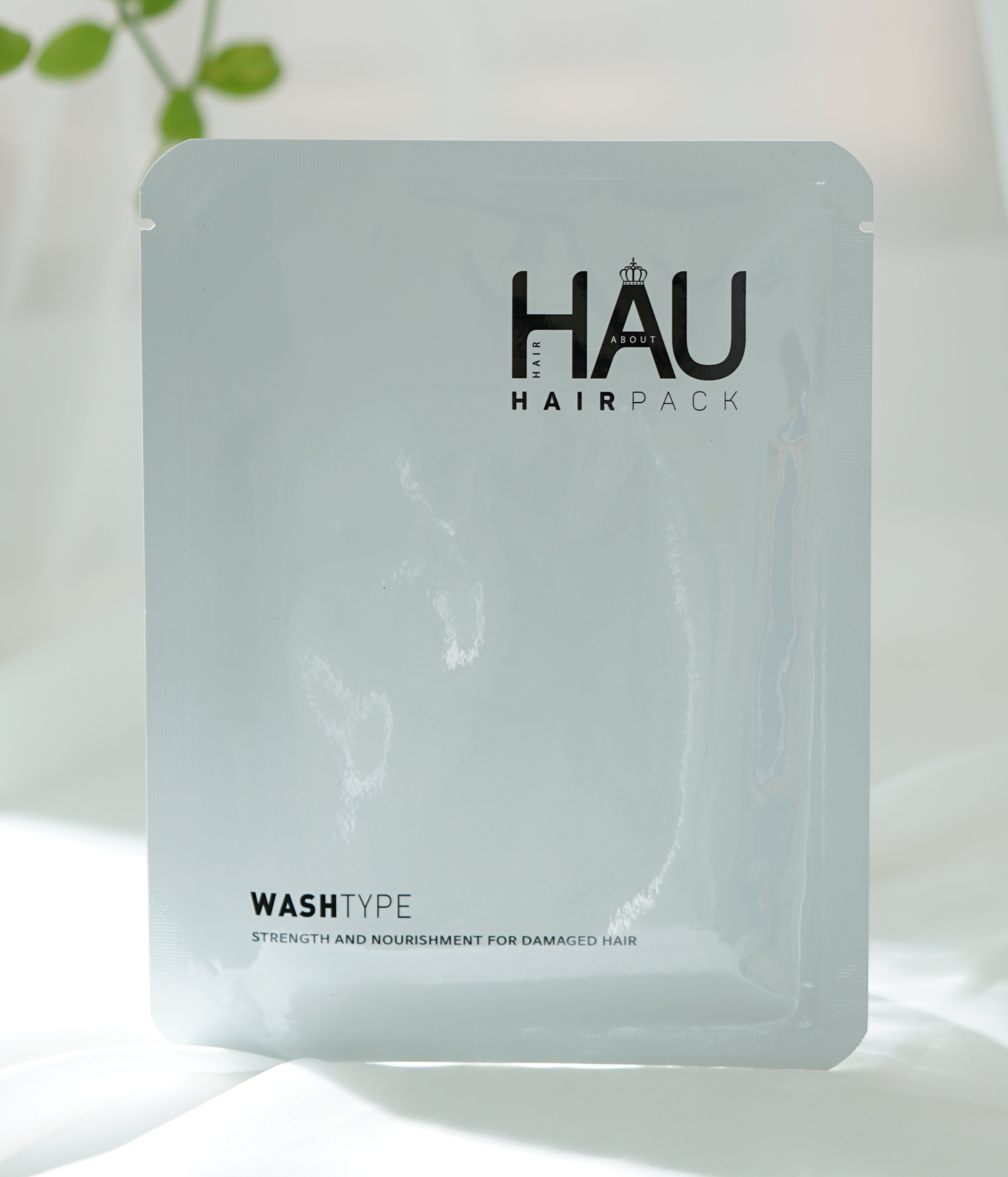 HAU Professional Hair Pack for dry damaged hair, showcasing the packaging and texture of the product.